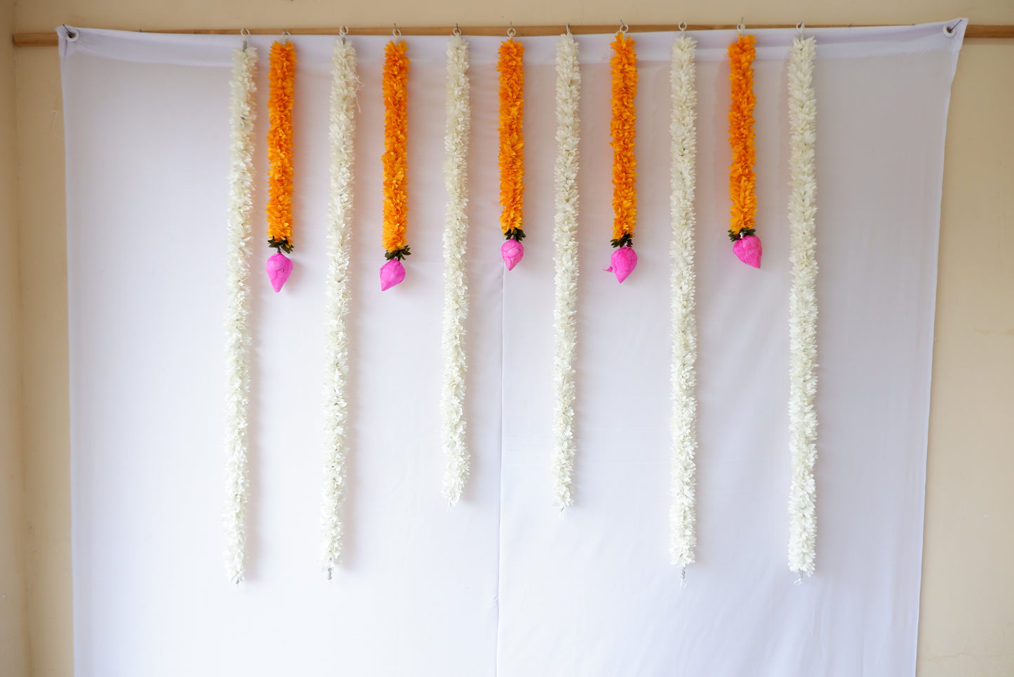 sriman decoration  flowers for pooja and festivals  orange and white colours combination