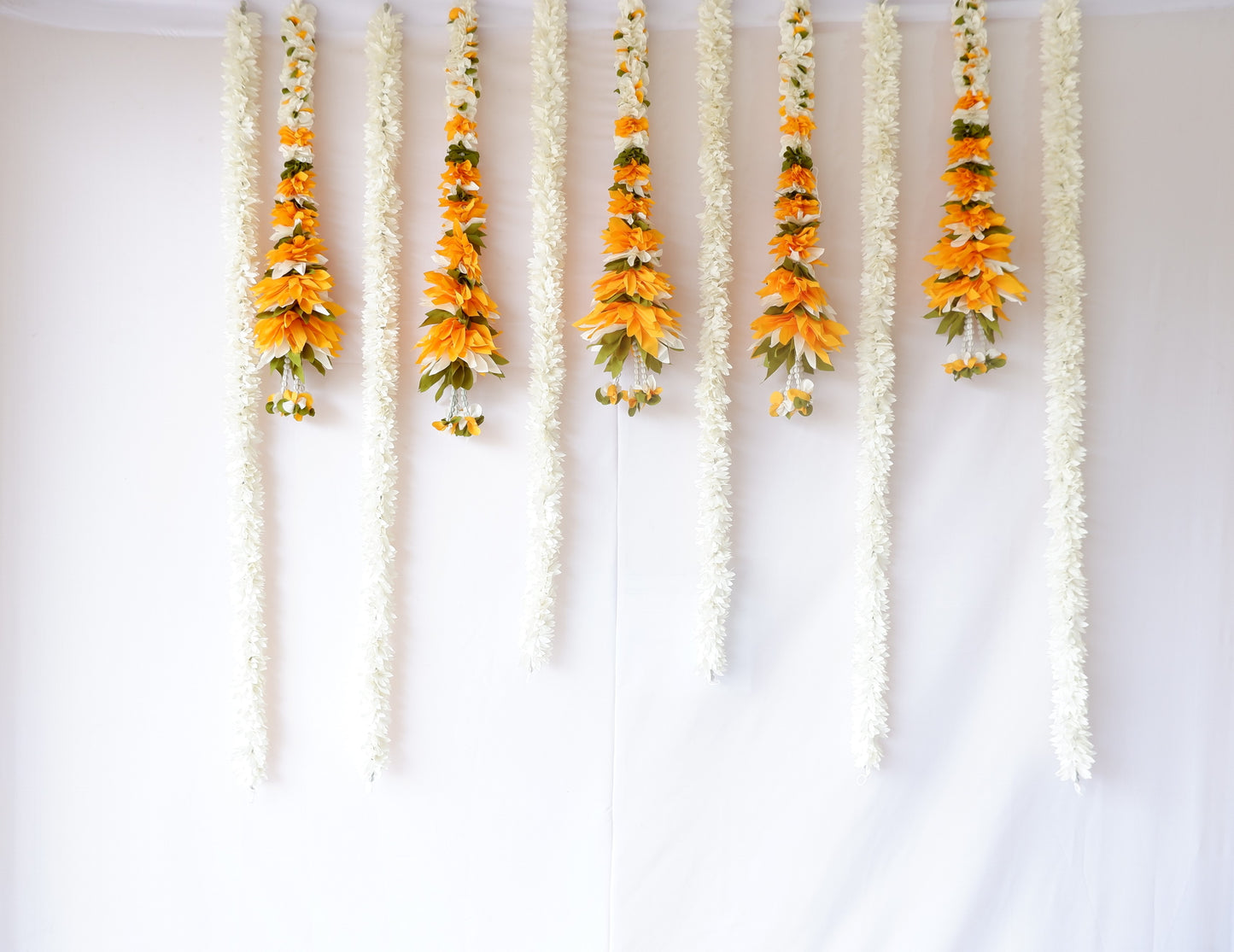 sriman artificial flowers and decoration of varamaha lakshmi background decoration  yellow flowers with white combination